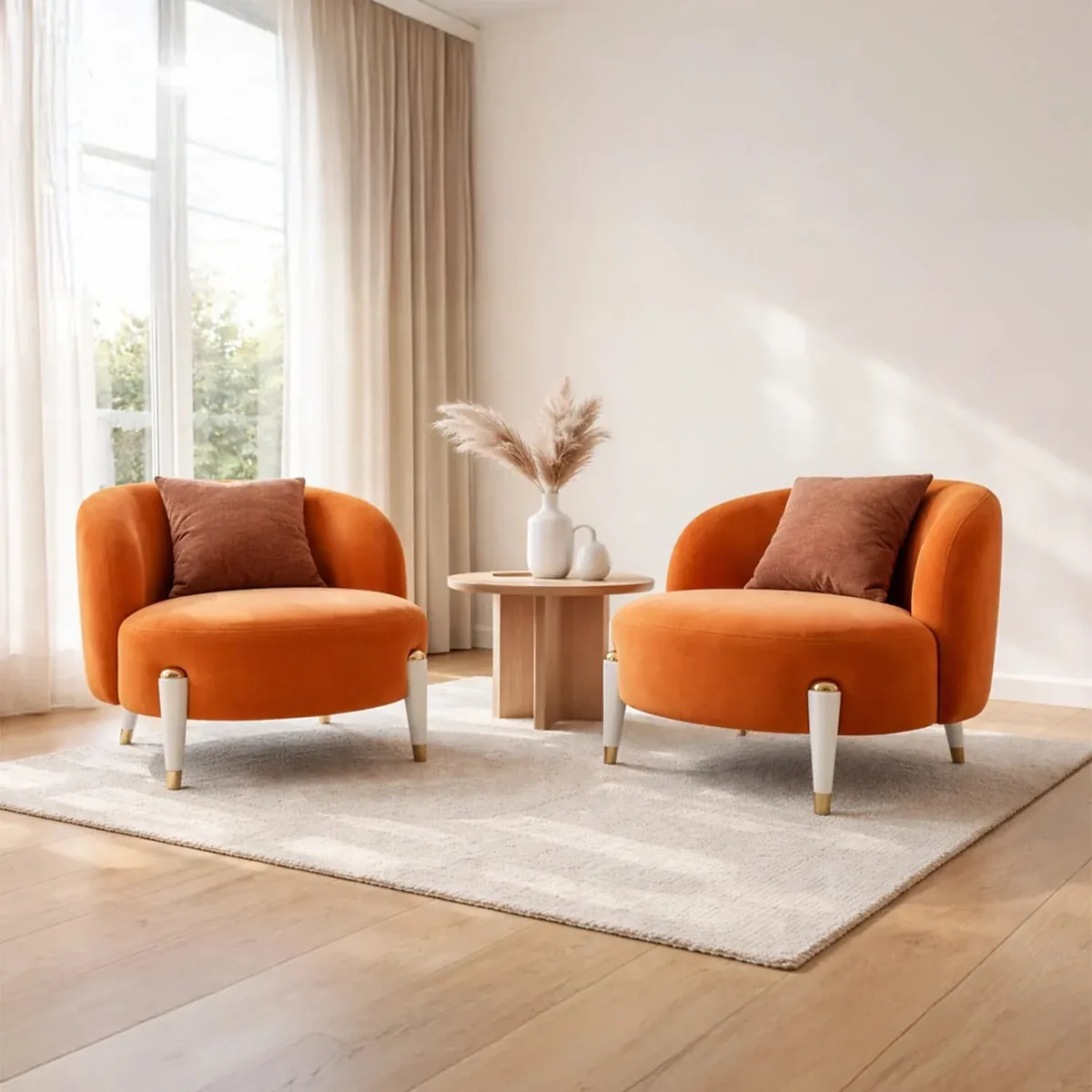 Two Contour Comfort chairs arranged facing each other with a small round side table on a pale rug in a bright room